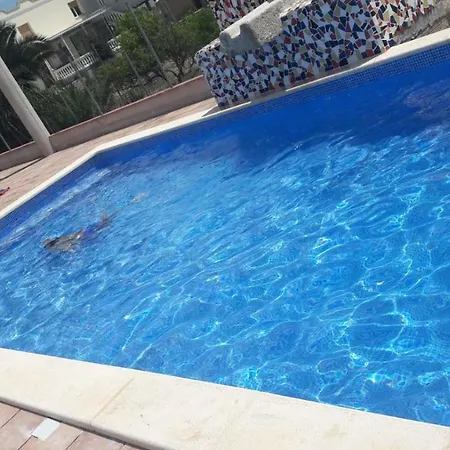 Апартаменты Casarosana *